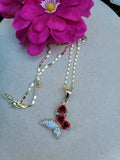 Butterfly pendant with red roses