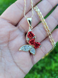 Butterfly pendant with red roses