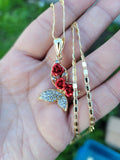 Butterfly pendant with red roses